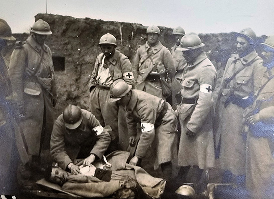 Hospital unit attending to wounded in trenches